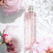a close up shot of a bottled perfume