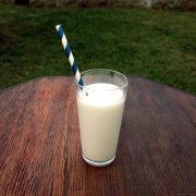 photo of glass of milk on table
